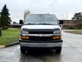 Front view of a 2021 Chevrolet Express van showing the grille headlights and logo