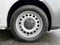 Close-up of a wheel featuring a silver rim with multiple circular holes and a Falken tire on a 2020 Mercedes-Benz Metris