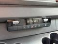 Dashboard controls of a 2022 Mercedes-Benz Sprinter featuring climate settings and buttons for AC and other functions