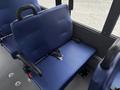 A blue seat with a seatbelt in a 2020 Chevrolet Express vehicle
