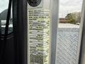 2016 Peterbilt 348 with a vehicle information plate detailing weight specifications and tire information