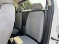 Interior view of the back seats of a 2017 Chevrolet Colorado featuring two gray upholstered seats with headrests