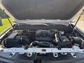 A 2017 Chevrolet Colorado engine compartment showing the Duramax 2.8 engine along with various components like the air intake and battery