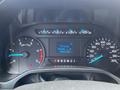 Dashboard of a 2017 Ford F-250 SD showing various gauges including speedometer and DEF level indicator with blue digital display and gear shift indicator