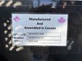 A label detailing the manufacturing information for a 2020 Peterbilt 330 including the model number and serial number