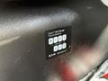 A close-up of the identification label on a 2012 International DuraStar 4300 showing Eaton Mid-Range Transmissions and gear selection options R135 Neutral 246
