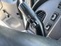 Close-up of a 2014 Freightliner M2 106 turn signal lever featuring settings for off pull and flash
