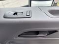 Interior door handle and window controls of a 2025 Peterbilt 536 featuring a sleek design and ergonomic placement