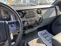 Interior view of a 2018 Ford F-750 showing the dashboard with controls and gauges