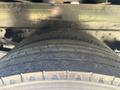 Close-up of the tread of a tire on a 2022 Isuzu NRR showing the detailed pattern and wear of the rubber surface