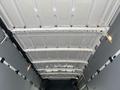 The interior ceiling of a 2025 Mercedes-Benz Sprinter van with a white finish and evenly spaced metal support beams