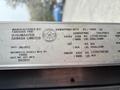 A 2012 Ford E-450 Super Duty vehicle identification plate displaying manufacturing details and specifications