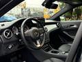 2016 Mercedes-Benz GLA-250 interior featuring a stylish dashboard black leather seats and modern controls