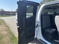 A 2017 Chevrolet Colorado with the driver's side door open displaying the interior and seating