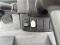 Close-up of control panel from a 2014 Wacker Neuson WL34 featuring buttons for operation and control functions