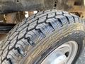 Close-up of a treaded tire on a 2017 Ford F-250 SD showing detailed patterns and grooves