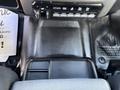 The image shows the interior floor area of a 2021 RAM 5500 featuring a textured floor mat and a panel with buttons for functions like lift gate and auxiliary controls