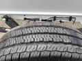 Close-up of a tire from a 2023 RAM Promaster 3500 showcasing its tread pattern and rubber texture