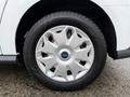 A silver alloy wheel with a Goodyear tire mounted on a 2017 Ford Transit Connect