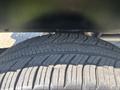 Close-up of a tire tread from a 2017 Chevrolet Colorado showing detailed patterns and grooves on the rubber surface
