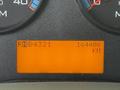 The dashboard display of a 2011 International 4300 showing an orange screen with the numbers RNO4321 and 164408 KM