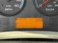 Dashboard of a 2014 International TerraStar showing gauges for RPM and speed alongside an information display indicating hours and temperature