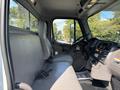 Interior view of a 2019 Freightliner M2 106 showing the driver's seat dashboard and controls without any passengers