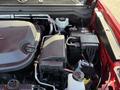 Engine compartment of a 2018 GMC Canyon showing the battery fuse box and various engine components