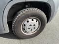 Close-up of a 2017 RAM Promaster tire with a steel wheel and visible tread pattern