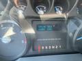 Dashboard display of a 2016 Ford F-350 SD showing engine idle and hours with gauges for RPM and turbo