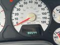 A dashboard of a 2006 Dodge Ram 2500 displaying speedometer and odometer readings with the odometer showing 80599 miles