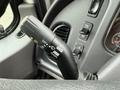 Close-up of the steering column stalk of a 2016 Freightliner 108SD featuring controls for headlights turn signals and wipers