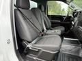 A 2022 GMC Sierra 1500 with two front seats featuring fabric upholstery and seatbelts fastened