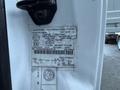 A 2010 Ford F-450 manufacturer's information label detailing specifications and vehicle identification number