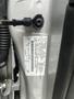 A 2018 Ford Focus vehicle identification number label attached to the inside of the driver's side door jamb