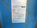 A blue industrial lift with specifications visible on a label including model name and weight capacities