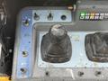 Control panel of a 2020 Haulotte HA61 LE PRO with joystick and various switches for operating the lift equipment