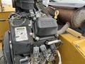 A Kohler engine with a black OHV cover and various attached components on a 2014 Vermeer Corporation Sweep Stump Cutter