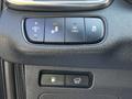 Controls and buttons on the dashboard of a 2017 Kia Sorento including features for AC and power options