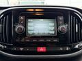 Dashboard display of a 2017 RAM ProMaster City showing radio and settings options with a digital screen and control buttons