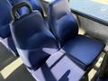 2019 Chevrolet Express bus seats designed for passenger comfort featuring a textured blue fabric upholstery
