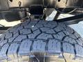 Close-up of a rugged tire from a 2018 RAM 3500 showcasing deep treads designed for durability and traction
