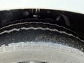 Close-up of the tire of a 2020 Mercedes-Benz Metris showing tread patterns and a portion of the wheel rim