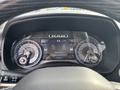 Dashboard of a 2021 RAM 1500 featuring speedometer and odometer displays with digital readouts for speed and engine hours
