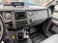 Interior view of a 2019 Ford F-750 showing the dashboard with audio controls gauges and storage compartments