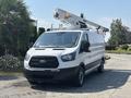 A white 2019 Ford Transit 350 van with a raised utility ladder rack on the roof and no visible markings or logos
