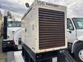 A 2005 Katolight SED60FPJ4 generator with a rusted exterior and a large air intake on top positioned on a black base