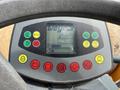 Control panel of a 2020 Hyundai HR110C featuring various buttons and a display screen showing operational information