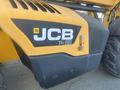 A yellow and black 2013 JCB 510-56 Loadall featuring the JCB logo and a control panel on the side