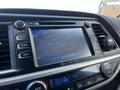 Dashboard display of a 2018 Toyota Highlander showing a rearview camera with blue and red guidelines on the screen